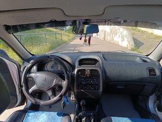 2000 Mitsubishi Carisma I Рестайлинг, серебристый, 230000 рублей, вид 4