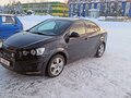 2015 Chevrolet Aveo II, чёрный, 900000 рублей