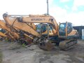 2012 Hyundai R220LC, жёлтый - вид 1