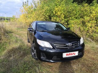 2010 Toyota Corolla X (E140, E150) Рестайлинг, чёрный, 950000 рублей, вид 3