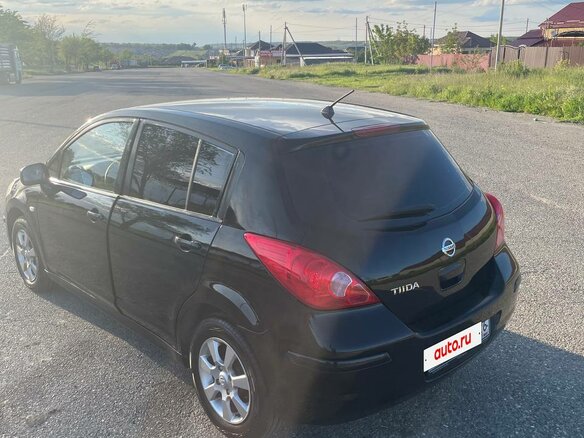 2007 Nissan Tiida I, чёрный, 610000 рублей - вид 4