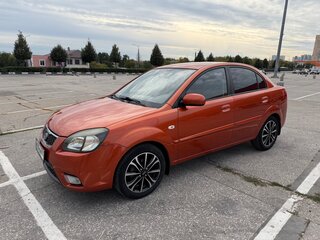 2010 Kia Rio II Рестайлинг, оранжевый, 600000 рублей, вид 2