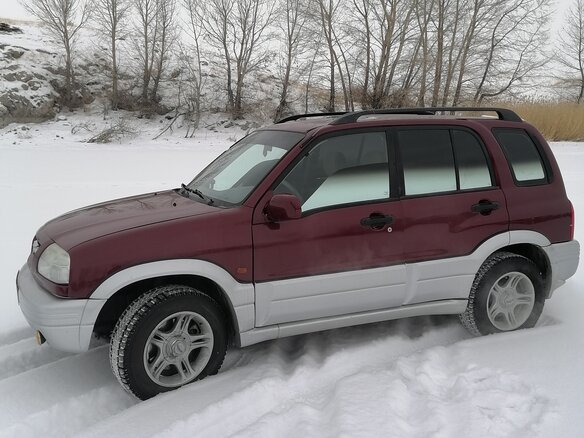 1999 Suzuki Grand Vitara I, пурпурный, 600000 рублей - вид 2