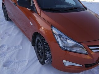 2014 Hyundai Solaris I Рестайлинг, оранжевый, 841999 рублей, вид 1
