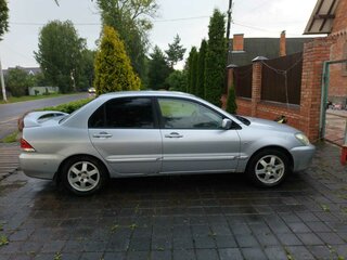 2006 Mitsubishi Lancer IX Рестайлинг, серебристый, 380000 рублей, вид 2