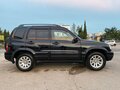 2000 Suzuki Grand Vitara I, чёрный - вид 3