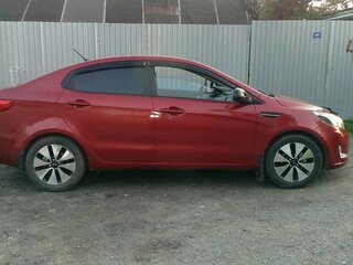 2014 Kia Rio 4-speed III, красный, 850000 рублей, вид 4