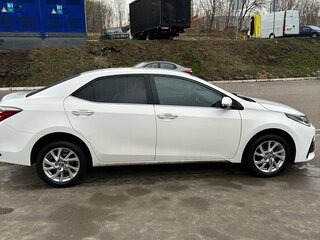 2016 Toyota Corolla XI (E160, E170, E180) Рестайлинг 1, белый, 2050000 рублей, вид 3