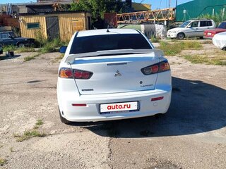 2011 Mitsubishi Lancer X Рестайлинг, белый, 720000 рублей, вид 3