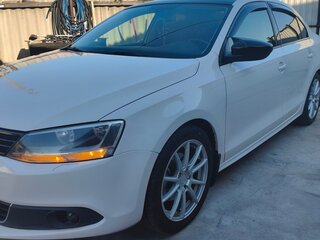 2011 Volkswagen Jetta VI, белый, 930000 рублей, вид 2