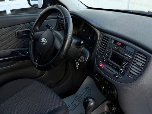2010 Kia Rio II Рестайлинг, серебристый - вид 15