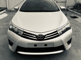 2013 Toyota Corolla XI (E160, E170, E180), серебристый, 1150000 рублей, вид 1