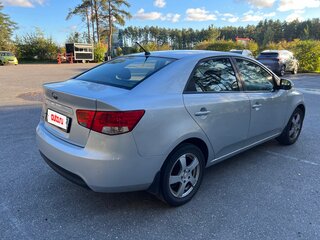 2010 Kia Cerato 5-speed II, серебристый, 629000 рублей, вид 4