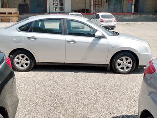2014 Nissan Almera III (G15), серый, 750000 рублей, вид 3