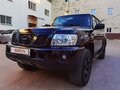 2005 Nissan Patrol V (Y61) Рестайлинг, чёрный - вид 3