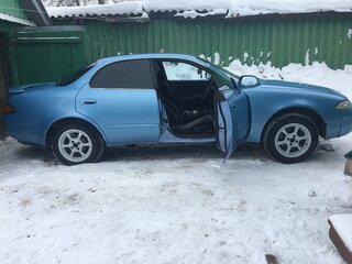 1994 Toyota Sprinter Marino, голубой, 360000 рублей, вид 2