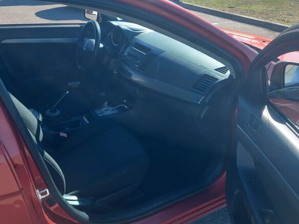 2011 Mitsubishi Lancer X Рестайлинг, красный, 650000 рублей - вид 10
