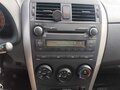 2008 Toyota Corolla AMT X (E140, E150), красный, 695000 рублей - вид 6
