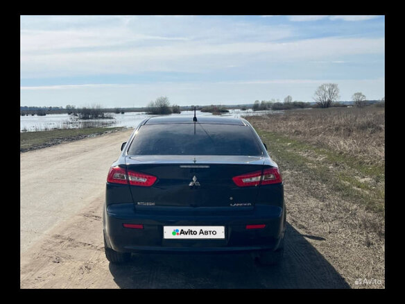 2008 Mitsubishi Lancer X, чёрный, 650000 рублей - вид 20
