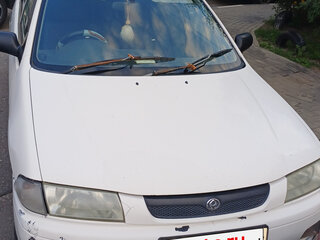 1997 Mazda Familia VII (BH), белый, 243000 рублей, вид 1