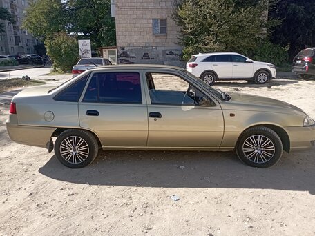 2010 Daewoo Nexia I Рестайлинг, золотистый, 240000 рублей, вид 2
