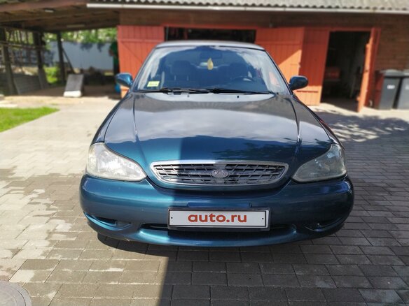 1999 Kia Clarus II, зелёный, 104437 рублей