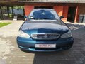 1999 Kia Clarus II, зелёный, 104437 рублей