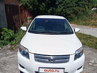 2008 Toyota Corolla Axio X (E140, E150), белый, 699000 рублей, вид 1