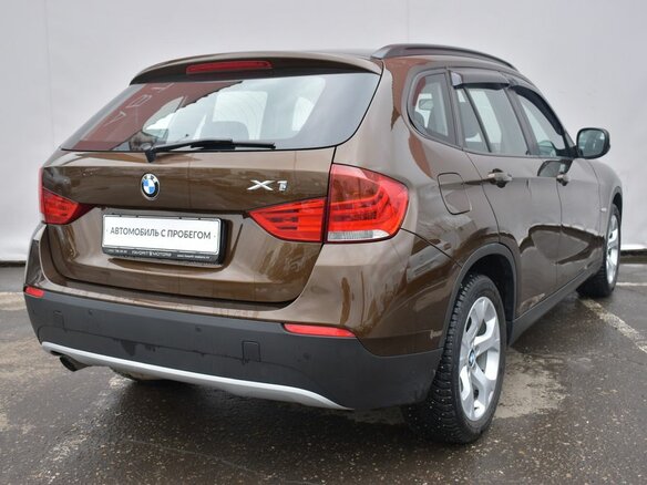2011 BMW X1 18i I (E84), коричневый - вид 2
