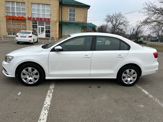 2015 Volkswagen Jetta VI Рестайлинг, белый, 925000 рублей, вид 4