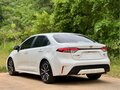 2023 Toyota Levin XII (E210) Рестайлинг, белый, 1460000 рублей - вид 5