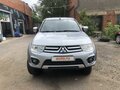 2014 Mitsubishi L200 Super Select IV Рестайлинг, серебристый - вид 1