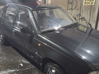 2012 Daewoo Nexia I Рестайлинг, чёрный, 200000 рублей, вид 2