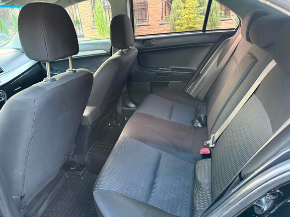 2012 Mitsubishi Lancer X Рестайлинг, чёрный, 669000 рублей - вид 30