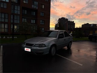 2011 Daewoo Nexia I Рестайлинг, серебристый, 197000 рублей, вид 1