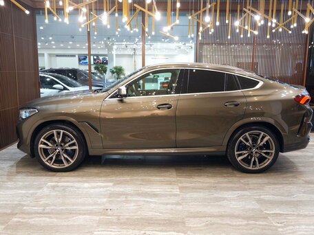 2020 BMW X6 M50i III (G06), коричневый, 7595000 рублей, вид 4