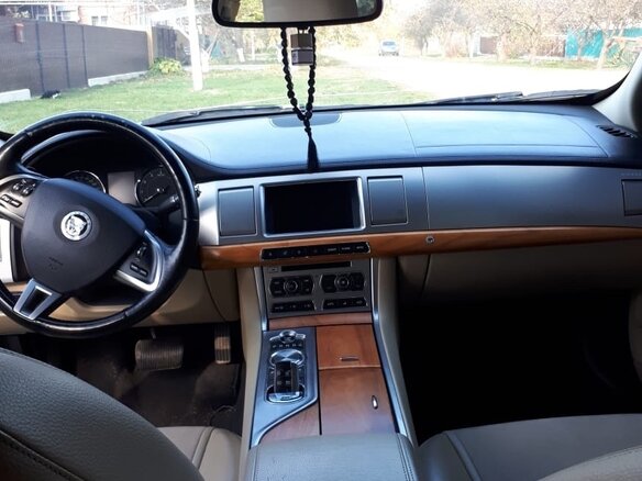 2013 Jaguar XF I Рестайлинг, коричневый, 1720000 рублей - вид 9