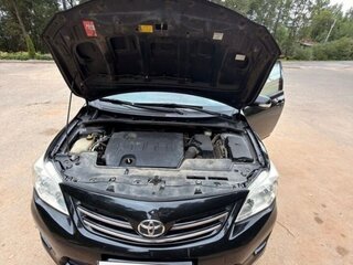 2012 Toyota Corolla X (E140, E150) Рестайлинг, чёрный, 920000 рублей, вид 1