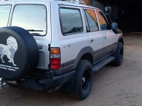 1996 Toyota Land Cruiser 80 Series Рестайлинг, серебристый, 1780000 рублей, вид 3