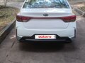2021 Kia Rio IV Рестайлинг, белый - вид 1