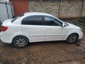 2009 Kia Rio II Рестайлинг, белый, 530000 рублей - вид 3