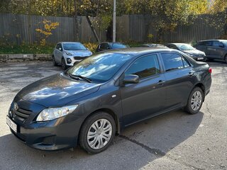 2010 Toyota Corolla X (E140, E150), серый, 910000 рублей, вид 3