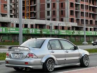 2005 Mitsubishi Lancer IX Рестайлинг, серебристый, 900000 рублей, вид 3