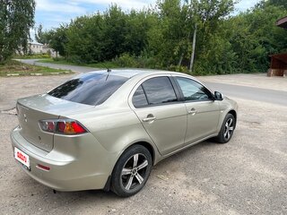 2011 Mitsubishi Lancer X Рестайлинг, золотистый, 700000 рублей, вид 4
