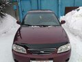 2006 Kia Spectra I Рестайлинг 2, пурпурный