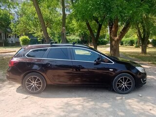 2014 Opel Astra J Рестайлинг, коричневый, 950000 рублей, вид 2