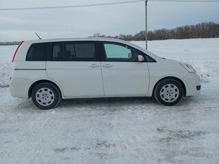 2009 Toyota ISis I, белый, 1248000 рублей, вид 4