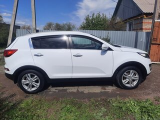 2015 Kia Sportage III Рестайлинг, белый, 1853000 рублей, вид 5