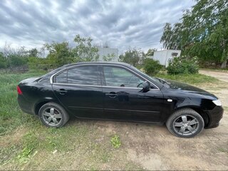 2010 Kia Magentis 5-speed II Рестайлинг, чёрный, 900000 рублей, вид 5