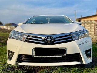 2014 Toyota Corolla XI (E160, E170, E180), белый, 1450000 рублей, вид 1